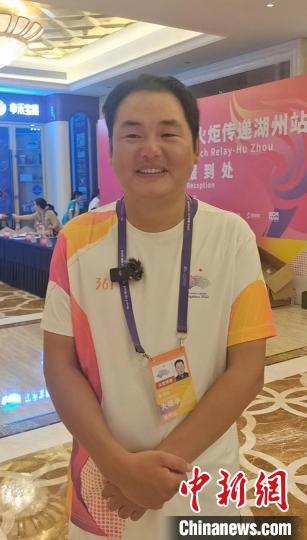 外卖骑手张洪叶担任亚运会火炬手 曾勇救跳河男